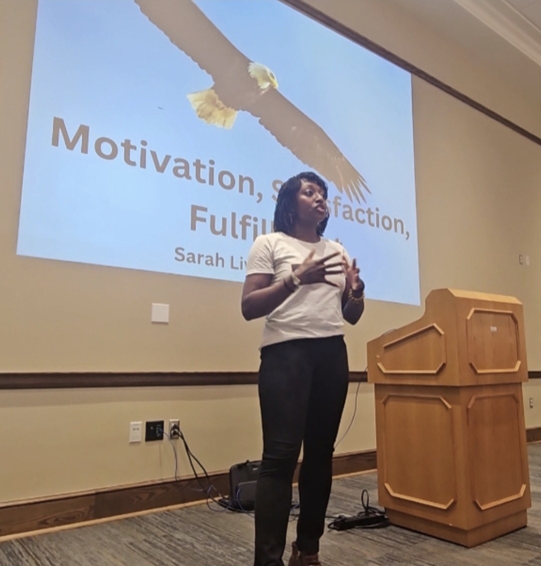 Sarah Livingstone presenting to an audience